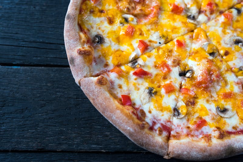 Marco's Classic Supreme pizza with pepperoni and vegetables