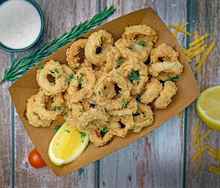 Crispy calamari rings with marinara dipping sauce