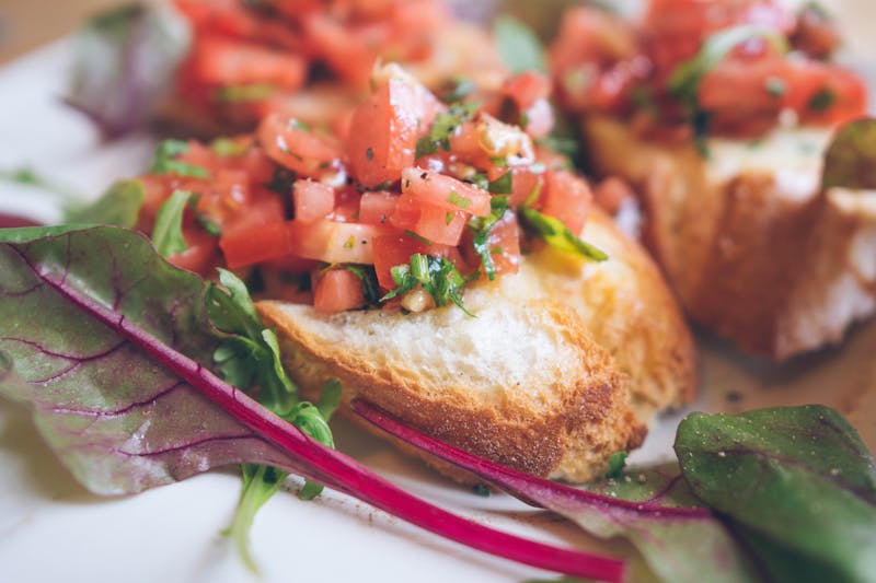 Bruschetta with tomato and basil on toasted bread